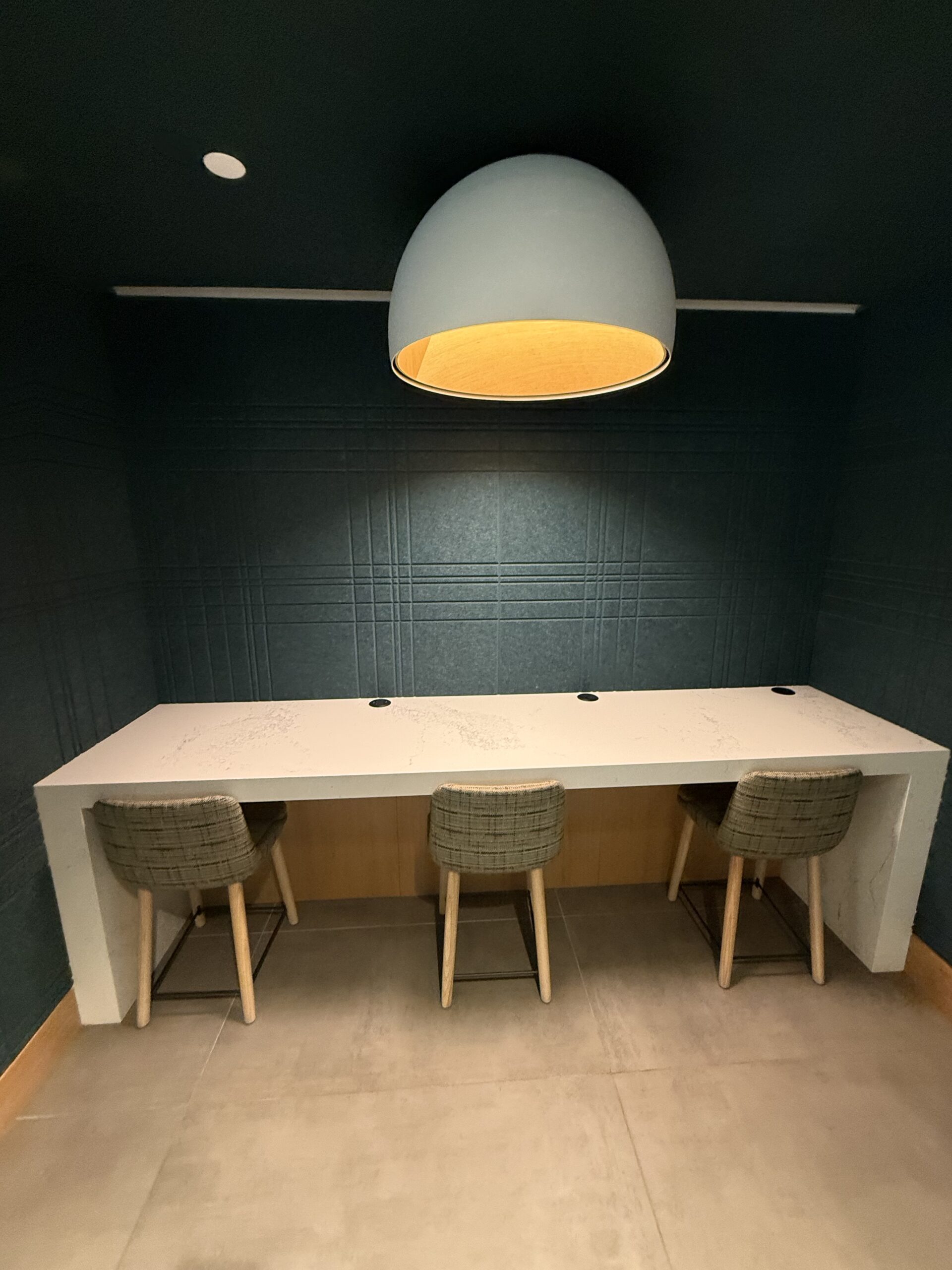 Shared study counter with three chairs at UC Irvine Plaza Verde